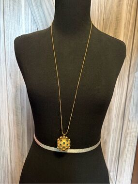 Tory Burch Celestial Locket Necklace.